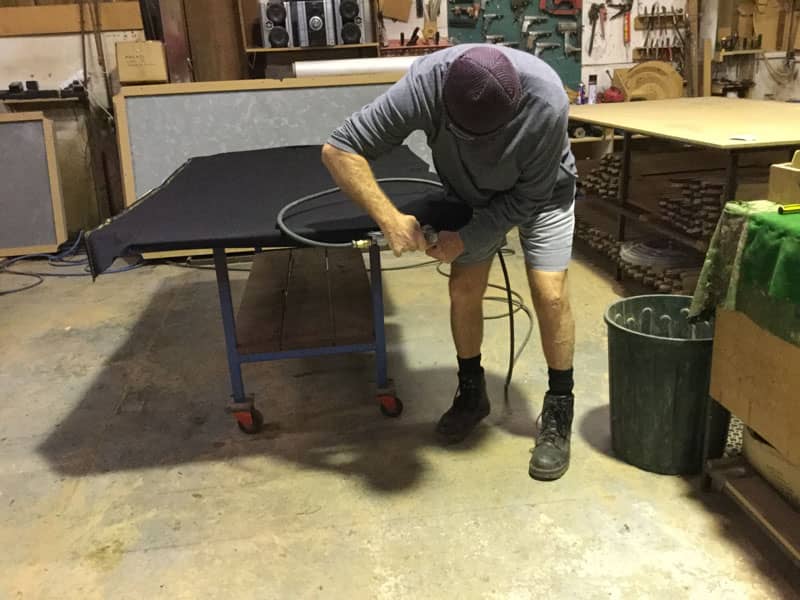 Rob from Quedos working on the Entertainer pool tabletop in the Quedos factory