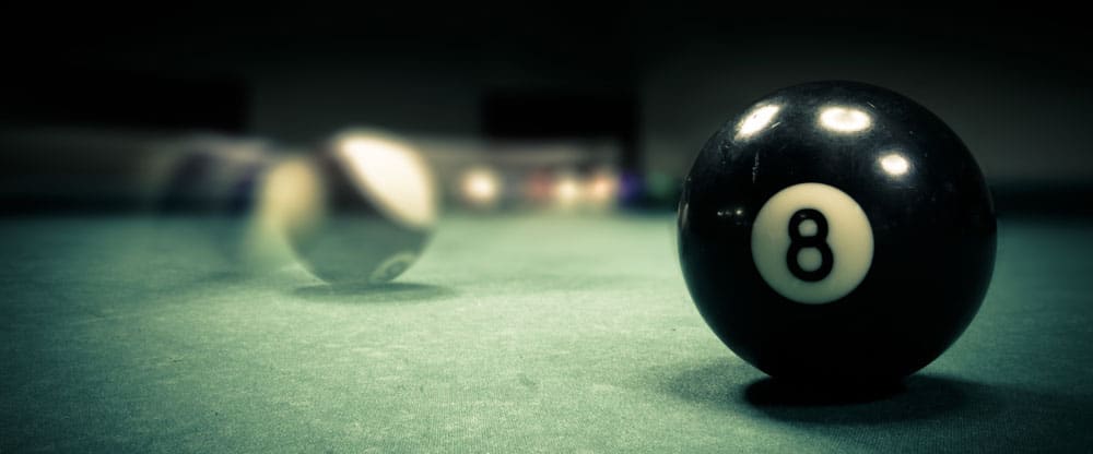 Pool balls in action on a table