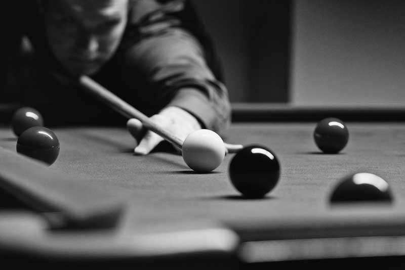 Game of snooker in black and white