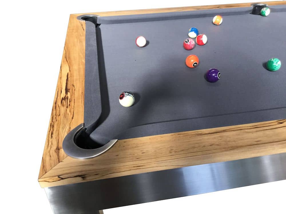 A corner of the visionary pool table with balls on it.