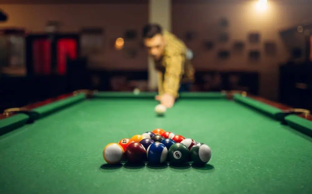 Man playing billiards