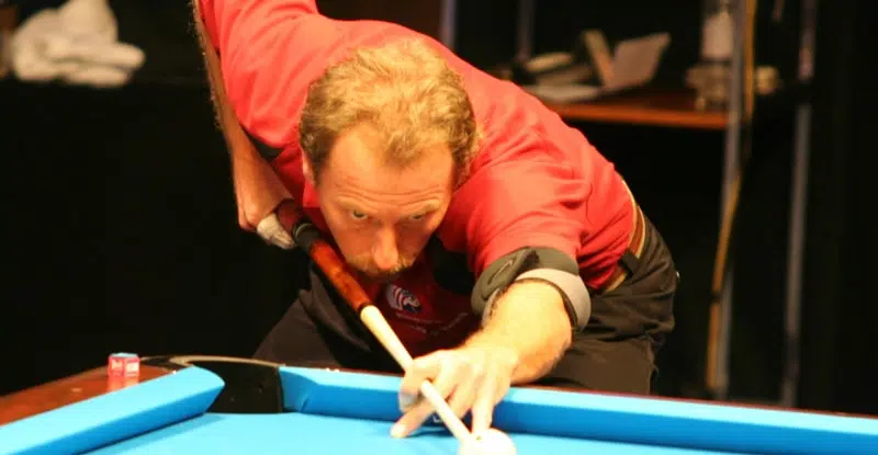 Earl Strickland taking a shot in snooker