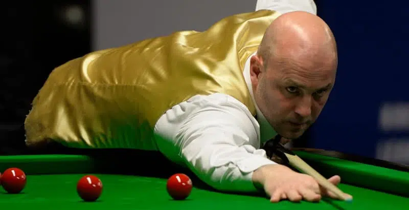 Mark King taking and important shot in snooker