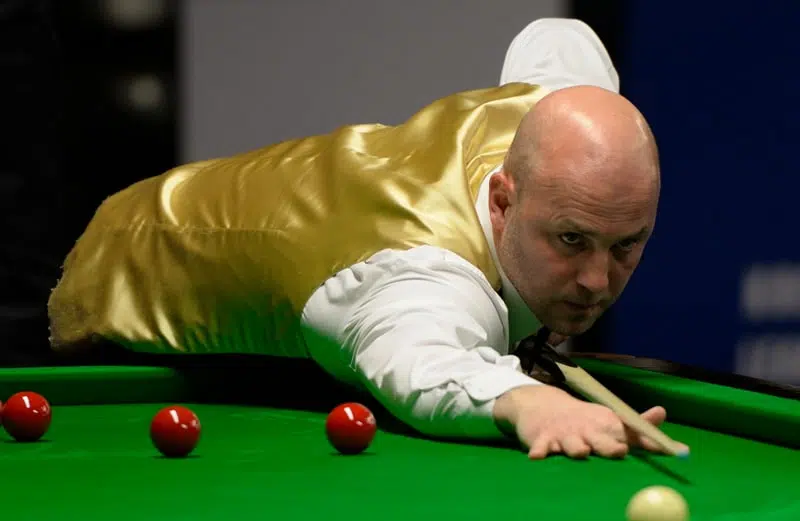 Mark King taking and important shot in snooker