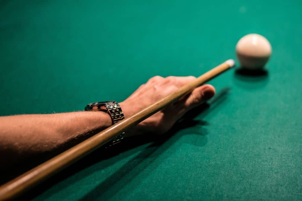 Playing pool.
